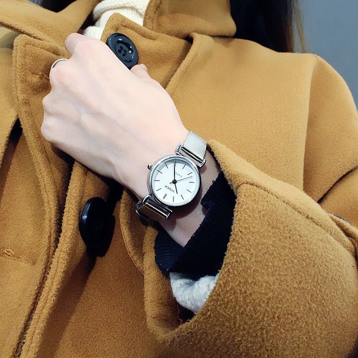 Đồng hồ nữ mặt trắng và đen